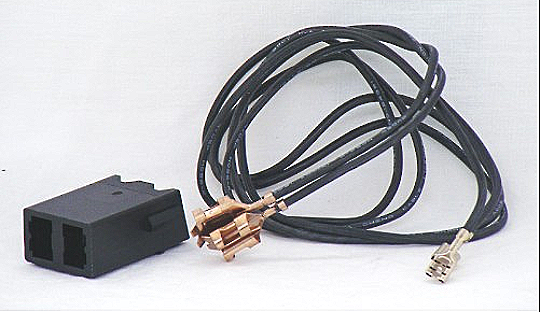 A black oven element connector block with wires attached, designed for use with Westinghouse and Simpson freestanding ovens.