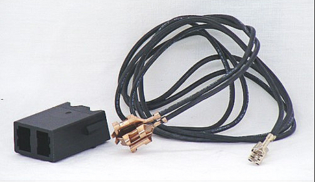 A black oven element connector block with wires attached, designed for use with Westinghouse and Simpson freestanding ovens.